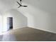 Carpeted bedroom featuring an angled ceiling and recessed lighting at 307 7Th St, Butner, NC 27509