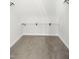 Walk-in closet with carpet and white shelving at 307 7Th St, Butner, NC 27509