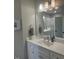 Bright bathroom vanity features neutral paint, white cabinets, and quartz countertop at 365 Rocky Crest Ln, Wake Forest, NC 27587