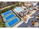 Aerial view of community featuring tennis courts, pool, and clubhouse at 3659 Coach Lantern Ave, Wake Forest, NC 27587