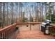 Cozy wooden back deck, perfect for grilling and relaxing with a wooded view at 3659 Coach Lantern Ave, Wake Forest, NC 27587