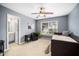 Cozy bedroom with neutral carpet, ceiling fan and ensuite bathroom at 3659 Coach Lantern Ave, Wake Forest, NC 27587