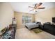 Bright bedroom with neutral carpet, ceiling fan and window at 3659 Coach Lantern Ave, Wake Forest, NC 27587