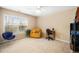 Bedroom featuring neutral carpet, ceiling fan and a large window at 3659 Coach Lantern Ave, Wake Forest, NC 27587