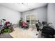 Bright office space with two workstations, large windows, and neutral carpeting at 3659 Coach Lantern Ave, Wake Forest, NC 27587