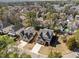 Aerial view highlighting two large homes on manicured lawns in a suburban setting at 3727 Bellevue Rd, Raleigh, NC 27609