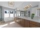 A stylish bathroom features double sinks, a soaking tub, and a large frameless shower at 3727 Bellevue Rd, Raleigh, NC 27609