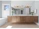 Bathroom featuring double vanity, marble counters, and elegant lighting at 3727 Bellevue Rd, Raleigh, NC 27609