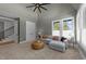 The living room features a vaulted ceiling, a large sectional sofa, and multiple windows at 3727 Bellevue Rd, Raleigh, NC 27609