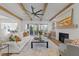 Bright living room with high ceilings, fireplace and comfortable seating with hardwood floors at 3727 Bellevue Rd, Raleigh, NC 27609