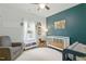 Stylish Bedroom with a rocking horse and natural light at 38 Parkside Dr, Lillington, NC 27546