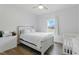Bright bedroom with a comfortable bed and natural light at 38 Parkside Dr, Lillington, NC 27546