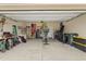 Spacious garage for parking and storage with overhead lighting at 38 Parkside Dr, Lillington, NC 27546