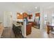 Kitchen with breakfast bar, pendant lighting, stainless steel appliances, and dining area at 38 Parkside Dr, Lillington, NC 27546