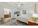 Serene main bedroom with white walls, ceiling fan, walk-in closet and an ensuite bathroom at 38 Parkside Dr, Lillington, NC 27546