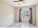 Neutral bedroom with a window at 3809 Volkswalk Pl, Raleigh, NC 27610