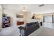 Comfortable living room with a large sectional sofa and open access to the kitchen area at 3809 Volkswalk Pl, Raleigh, NC 27610