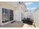 Back patio with sliding glass door to the yard at 3809 Volkswalk Pl, Raleigh, NC 27610