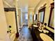 Bathroom boasts double sinks and shower-tub combo at 59 Willow Lake Rd, Roxboro, NC 27574