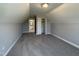 A bedroom with closet with sliding doors and gray walls at 70 Prency Ln, Middlesex, NC 27557