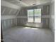 Unfinished room showcasing drywall, bright window and spacious layout at 70 Prency Ln, Middlesex, NC 27557