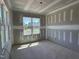 A well-lit room features two windows offering a pleasant outdoor view, ready for personalization at 70 Prency Ln, Middlesex, NC 27557