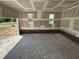 A spacious two-car garage is well-lit with two windows and ready for vehicles and storage at 70 Prency Ln, Middlesex, NC 27557