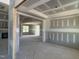 An unfinished living room showcases an open layout with abundant natural light and a tray ceiling at 70 Prency Ln, Middlesex, NC 27557