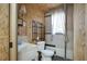 Cozy bathroom featuring a toilet and sink with modern fixtures and a window at 765 Townsville Landing Rd, Henderson, NC 27537