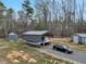 Carport for boat and RV parking and an additional shed at 765 Townsville Landing Rd, Henderson, NC 27537
