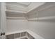 Walk-in closet with built-in shelving and ample storage space at 765 Townsville Landing Rd, Henderson, NC 27537