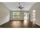 Bright living room features dark hardwood floors and abundant natural light at 765 Townsville Landing Rd, Henderson, NC 27537