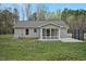 Back of the house with a screened-in porch at 765 Townsville Landing Rd, Henderson, NC 27537