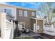 Backyard patio, white fence, and lawn create a private outdoor space at 801 Myrtle Grove Ln, Apex, NC 27502