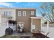 Backyard patio, white fence, and lawn create a private outdoor space at 801 Myrtle Grove Ln, Apex, NC 27502