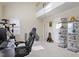 Bright and open living room with high ceilings, a large window, and a gaming chair at 801 Myrtle Grove Ln, Apex, NC 27502