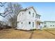 White house featuring a bright red front door at 802 Pleasant Dr, Durham, NC 27703