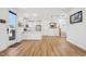 Open living space featuring stairs, stainless steal appliances and hardwood floors at 802 Pleasant Dr, Durham, NC 27703