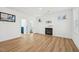 Beautiful living space that features hard wood floors and a modern electric fireplace at 802 Pleasant Dr, Durham, NC 27703
