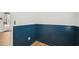 Room with blue wainscoting and wood look flooring at 802 Pleasant Dr, Durham, NC 27703