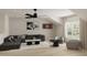 Versatile bonus room with a sectional sofa, games, and plenty of space for recreation at 108 N Stonemill Trl # Homesite 254, Wilson's Mills, NC 27520