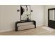 Inviting entryway featuring sleek console table and modern decor for a stylish welcome at 108 N Stonemill Trl # Homesite 254, Wilson's Mills, NC 27520
