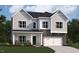 Charming two-story home with stone accents, a two-car garage, and a well-manicured lawn at 108 N Stonemill Trl # Homesite 254, Wilson's Mills, NC 27520