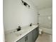 Bright bathroom featuring a double vanity with modern fixtures and a shower-tub combination at 108 N Stonemill Trl # Homesite 254, Wilson's Mills, NC 27520