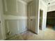 Unfinished bathroom featuring plumbing fixtures and doorway, ready for customization at 108 N Stonemill Trl # Homesite 254, Wilson's Mills, NC 27520