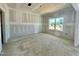 Bright bedroom with a large window offering ample natural light at 108 N Stonemill Trl # Homesite 254, Wilson's Mills, NC 27520