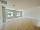 Large bonus room with ample natural light, perfect for customization and relaxation at 108 N Stonemill Trl # Homesite 254, Wilson's Mills, NC 27520