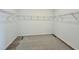 Walk-in closet with ample space for storage and organization with wire racks at 108 N Stonemill Trl # Homesite 254, Wilson's Mills, NC 27520