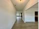 Bright foyer with wood-look flooring and ample natural light, leading into the main living areas at 108 N Stonemill Trl # Homesite 254, Wilson's Mills, NC 27520
