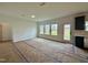 Spacious living room featuring large windows and a view to the backyard at 108 N Stonemill Trl # Homesite 254, Wilson's Mills, NC 27520